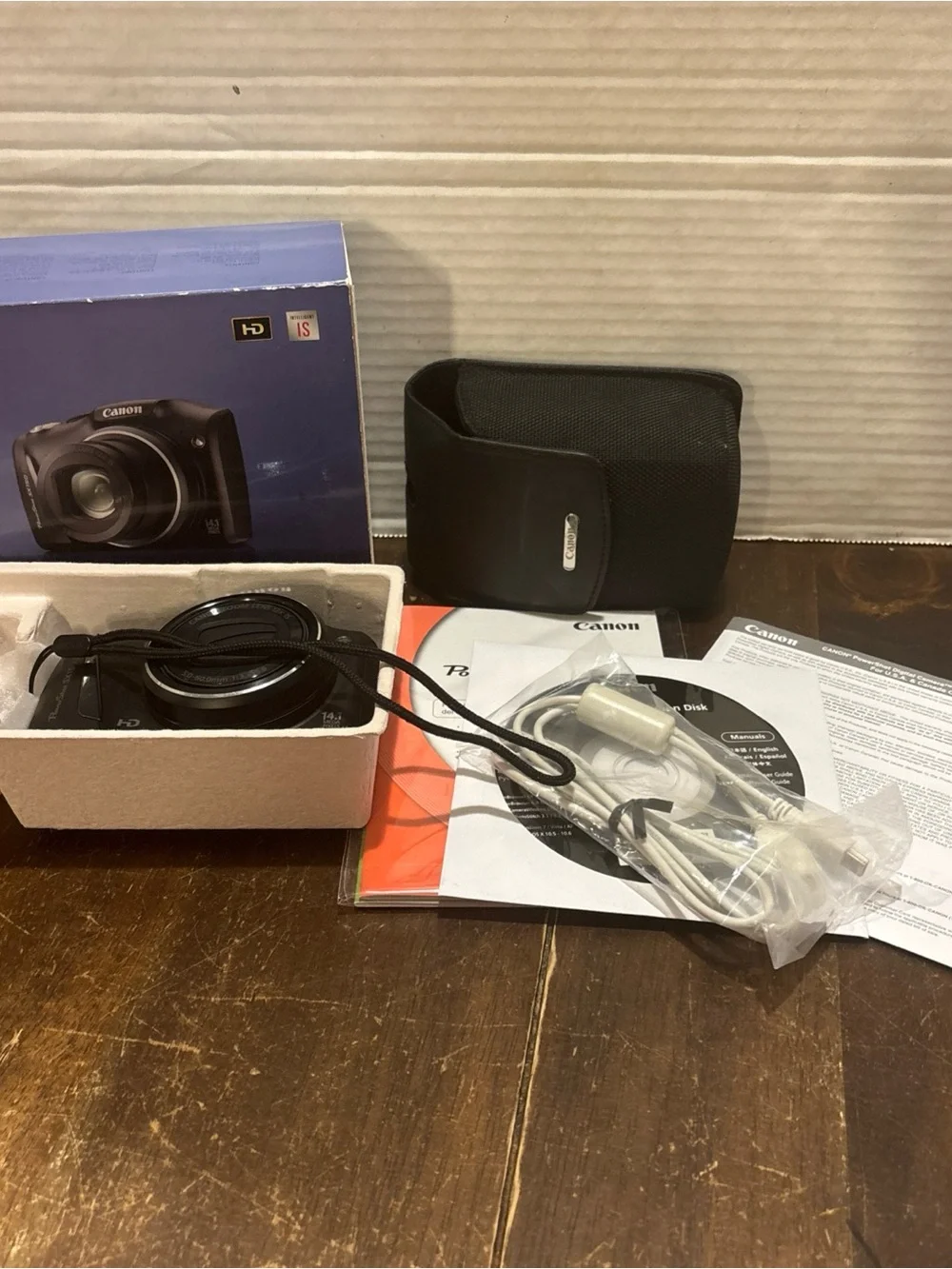 Canon Black Compact Digital Camera with Black Case and Accessories